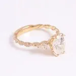 Vintage Twist Band Three-Stone Oval Moissanite Engagement Ring with Pear Cut Accents