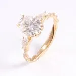 Vintage Twist Band Three-Stone Oval Moissanite Engagement Ring with Pear Cut Accents