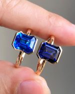 2.5ct Emerald Cut Sapphire V Bezel Set Ring In Cobalt Blue And Royal Blue
