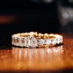 Yellow Gold 6.6CTW Round And Emerald Cut Splendor Moissanite Ring
