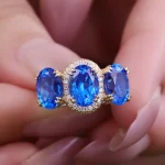​​Cobalt Blue Lab Gemstone Ring | 18K Gold Halo Setting with Moissanite Embrace​