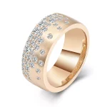 Wide Brushed Finish Round Moissanite Ring with Scattered Flush Set Stones