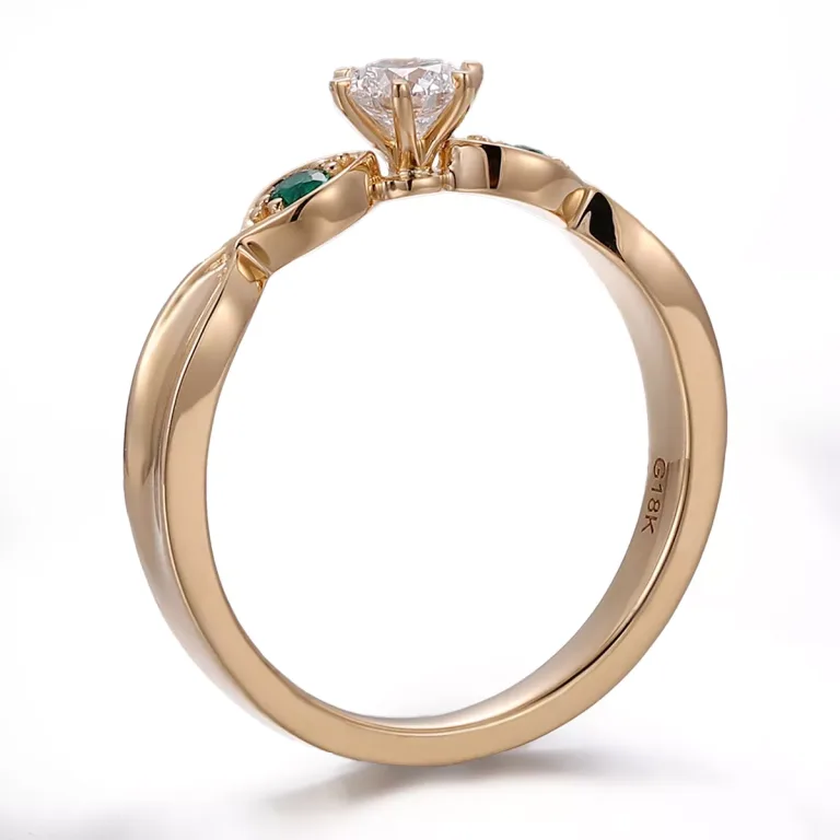 Round Moissanite Ring with Emerald Leaf Accents