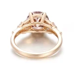 Classic Round Cut Moissanite Engagement Ring with Tapered Baguette Accents