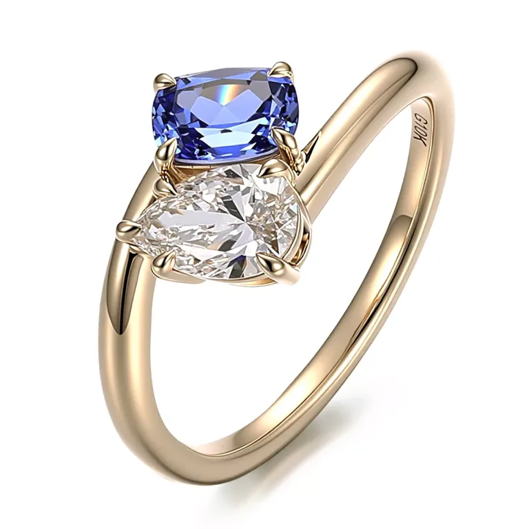 Toi et Moi Ring with Cushion Cut Blue Gemstone and Pear Moissanite