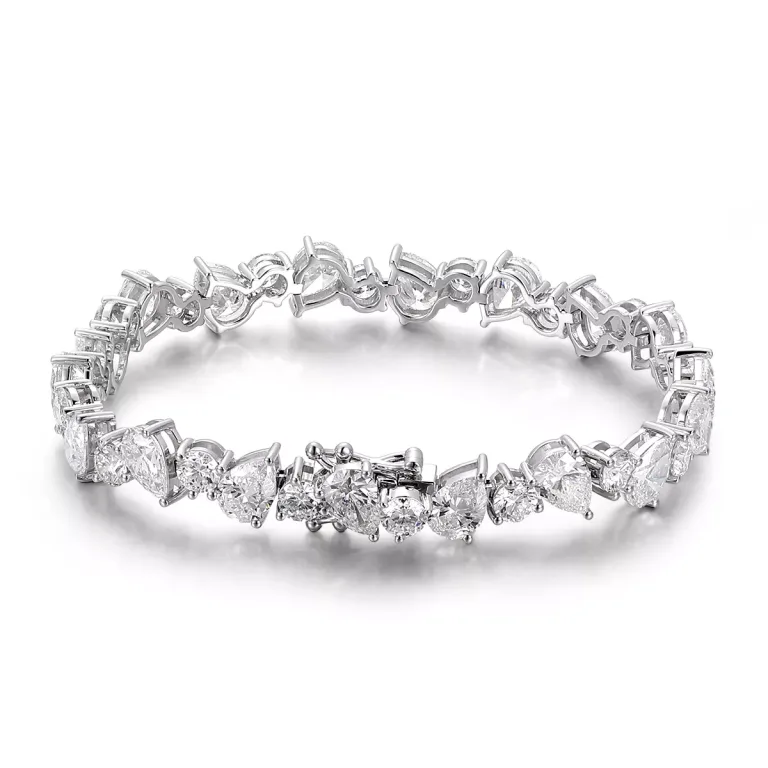 Pear Cut and Round Cut Moissanite Bracelet with Sparkling Multi-Shape Cluster Design