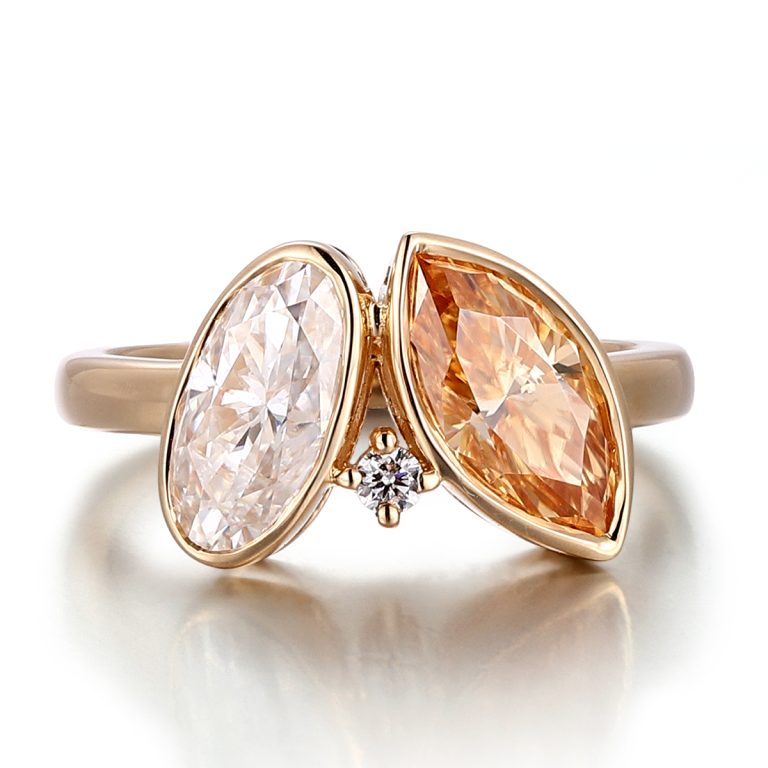 Three Stone Ring Featuring Oval And Marquise Cut Champagne And White Moissanite